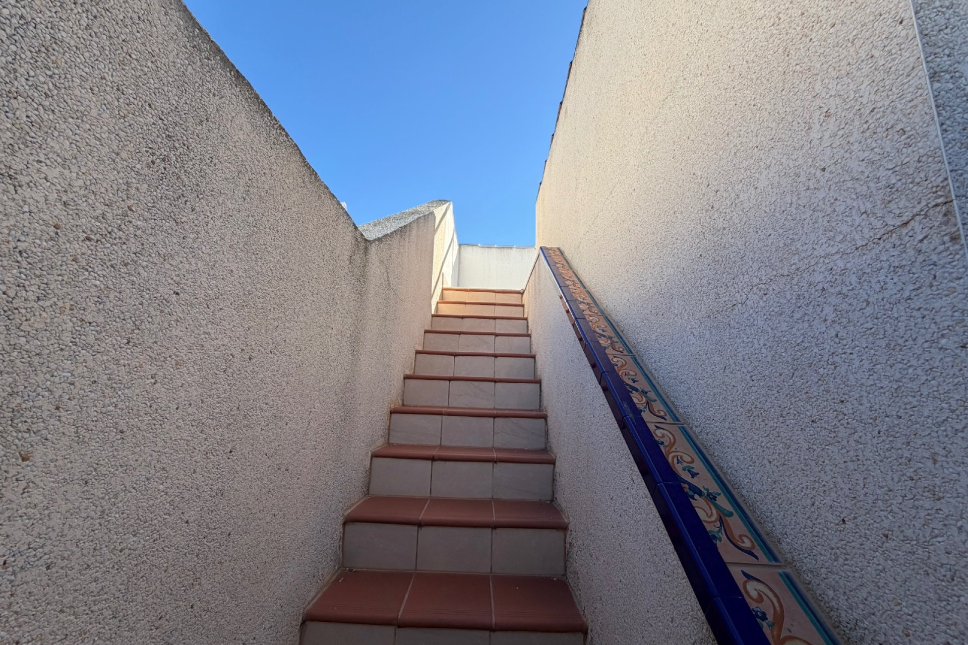 Escalera de acceso al solárium